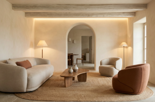 Organic curves in a rustic modern living interior with arched doorway, sculptural furniture, and soft plaster textures